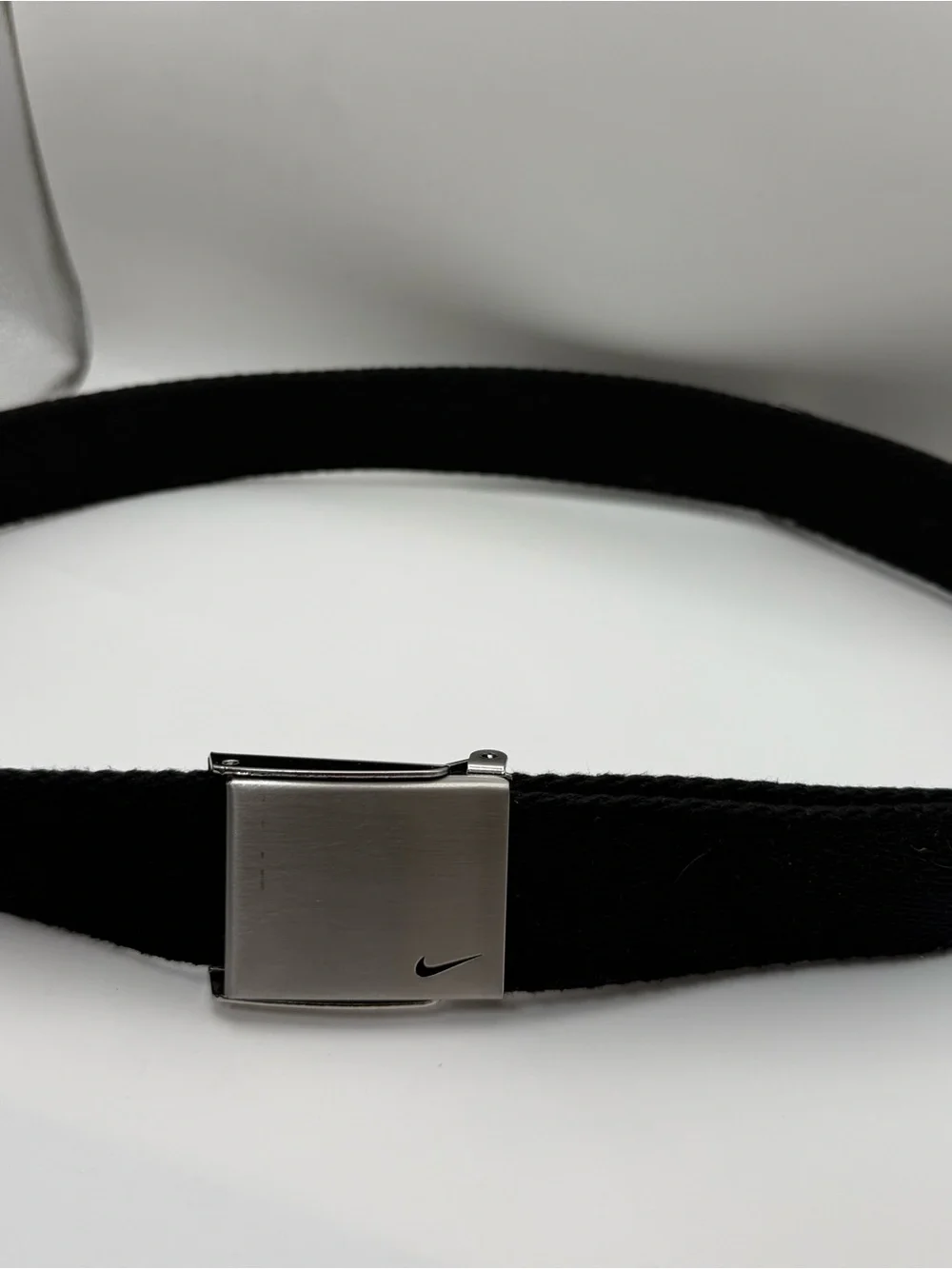 Nike Black Web Belt Silver Swoosh Plaque Buckle Adjustable One Size DS5022